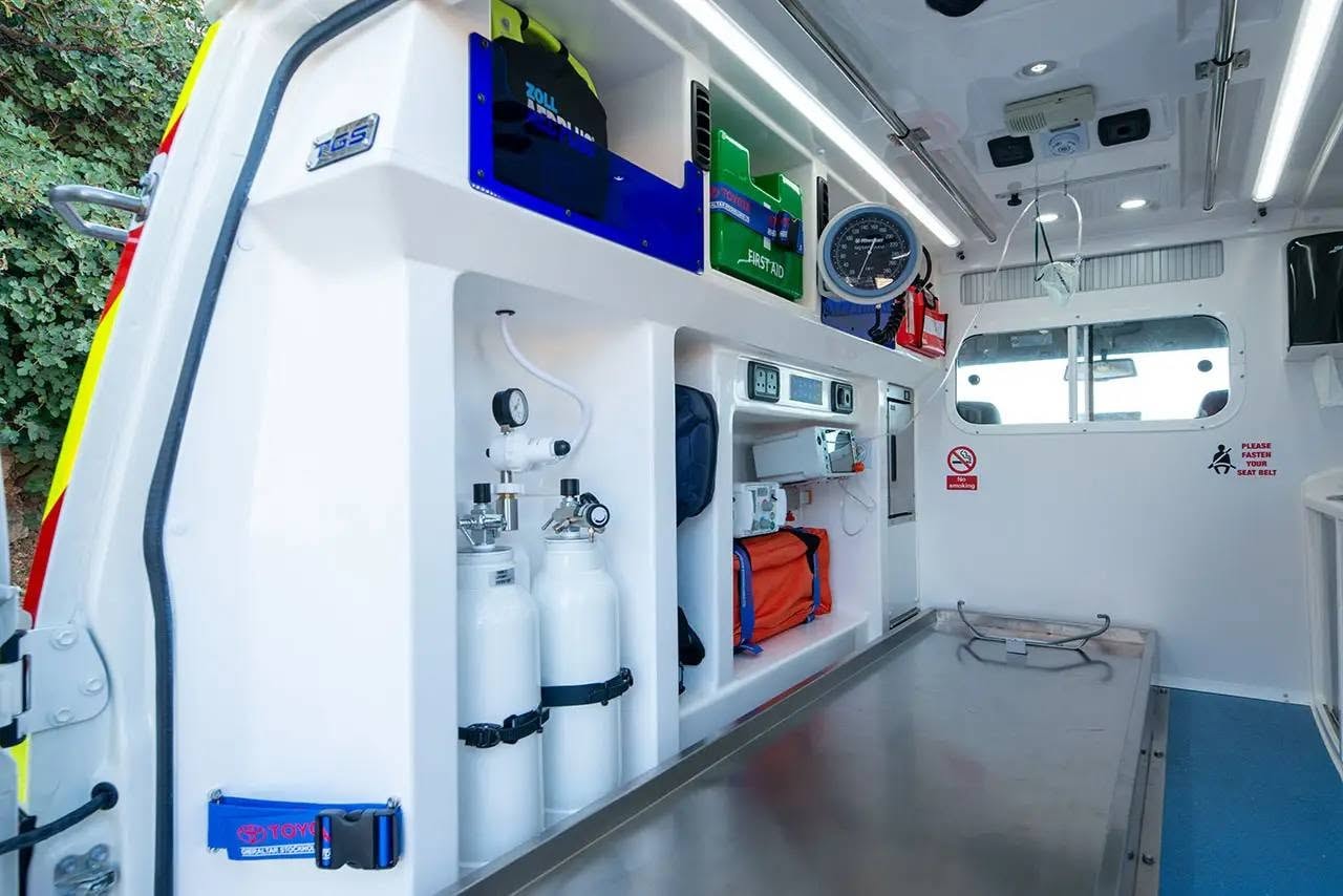 Ambulance interior — medical equipment storage and oxygen cylinders